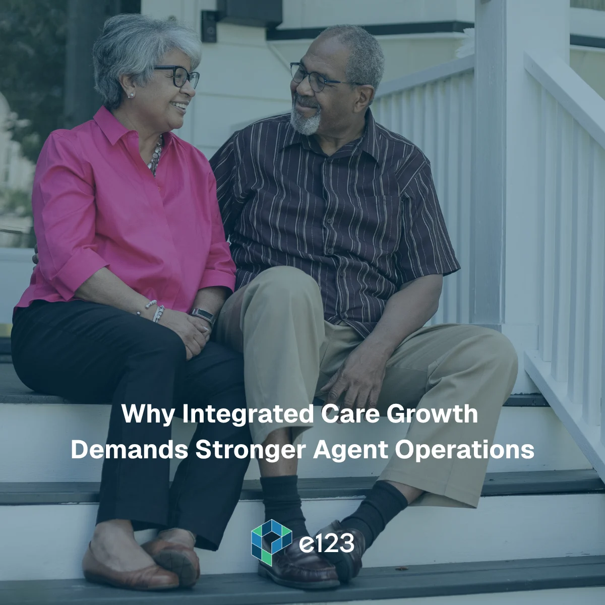 An older couple sits smiling on outdoor steps. The text reads, Why Integrated Care Growth Demands Stronger Agent Operations and D-SNP Agent Oversight. The logo e123 appears at the bottom.